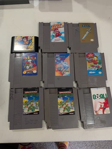 Lot of 9 NES / Sega Non Working Cartridges - Zelda, Superman, TMNT, Mario, Etc